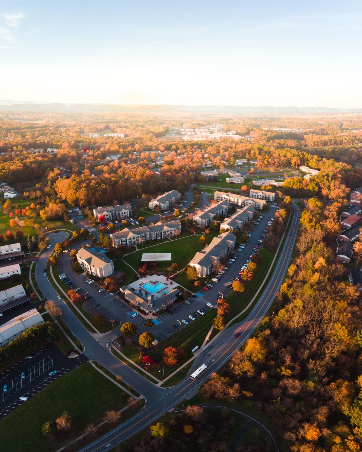 An aerial view of a residential community at golden hour